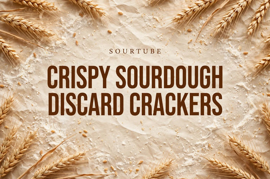 SourTube featured image: Crispy Sourdough Discard Crackers title on warm bakery background